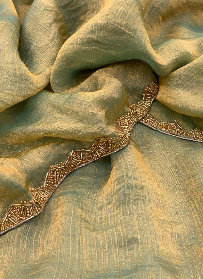 Amazing Teal Green Shaded Heavy Lace Border Silk Saree For Reception