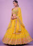 Amazing Yellow Haldi Wear Mirror Work Georgette Lehenga Choli