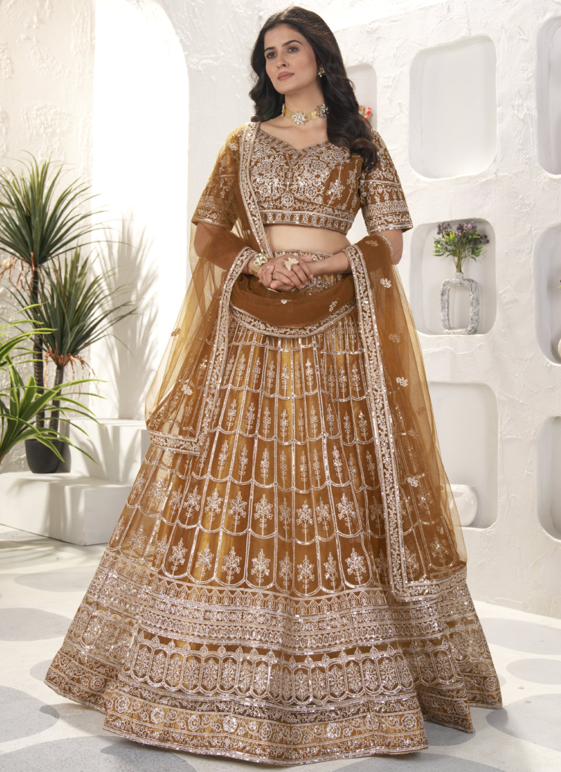 Attractive Sequence Embroidered Net Party Wear Golden Lehenga Choli