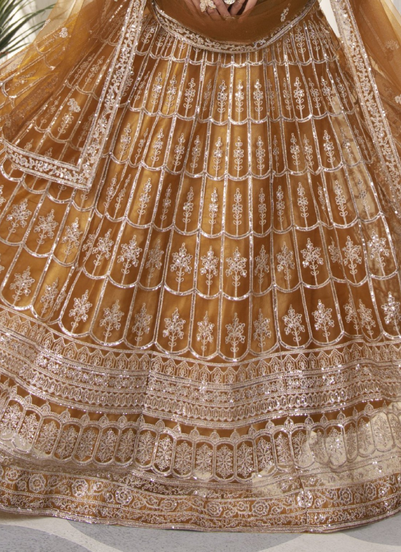 Attractive Sequence Embroidered Net Party Wear Golden Lehenga Choli