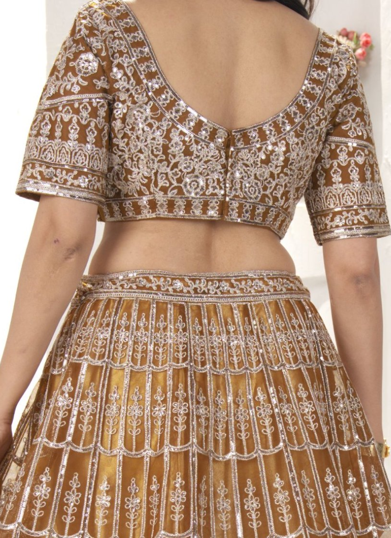 Attractive Sequence Embroidered Net Party Wear Golden Lehenga Choli