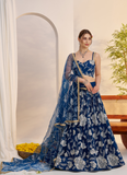 Attractive Thread Embroidered Navy Blue Net Lehenga Choli For Party
