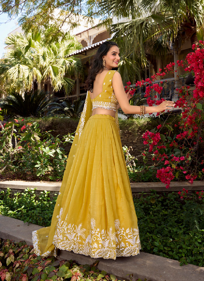 Attractive Thread Embroidered Silk Haldi Special Yellow Lehenga Choli