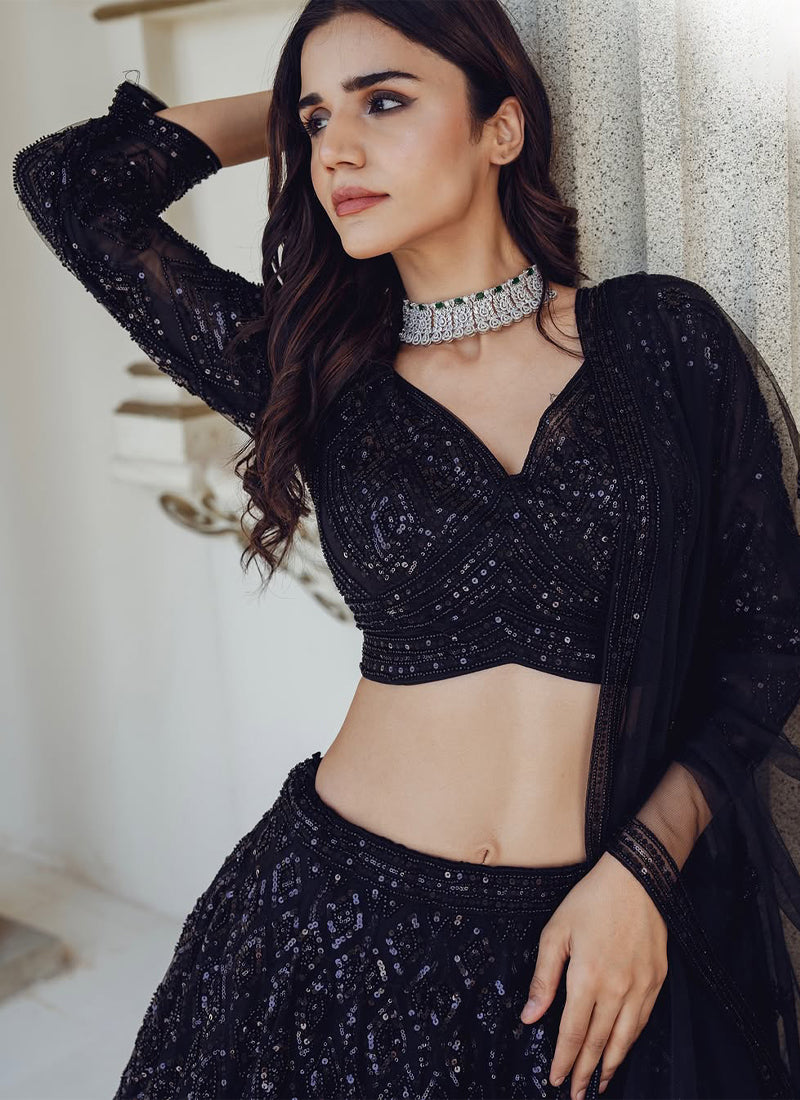 Beautiful Sequence Embroidered Party Wear Black Net Lehenga Choli