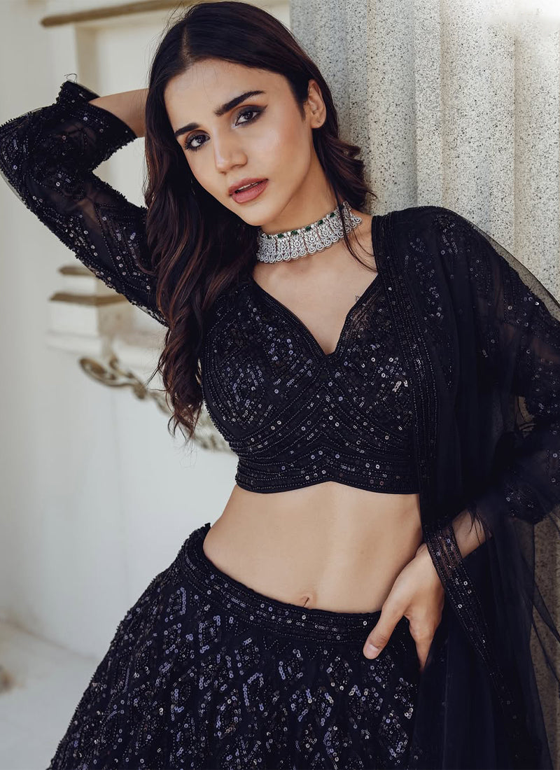 Beautiful Sequence Embroidered Party Wear Black Net Lehenga Choli