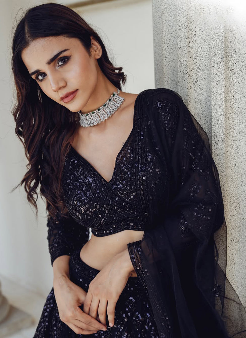 Beautiful Sequence Embroidered Party Wear Black Net Lehenga Choli