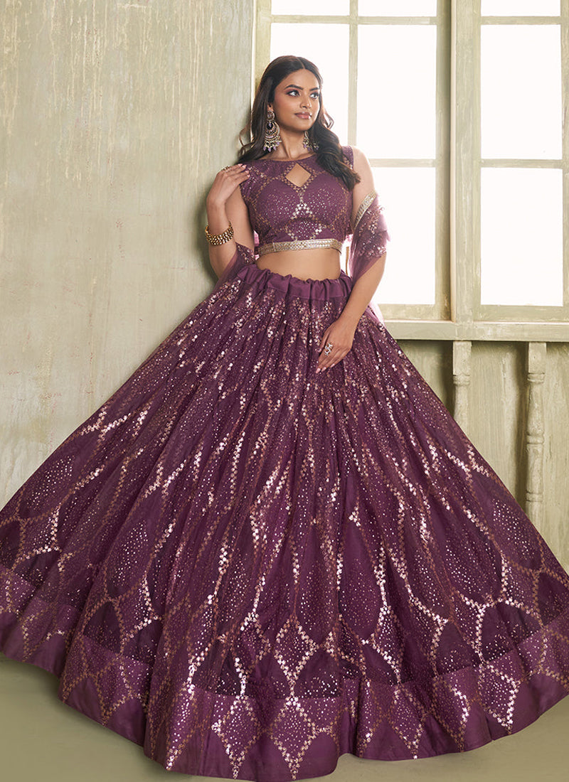 Beautiful Sequence Embroidered Wine Net Lehenga Choli For Wedding.2