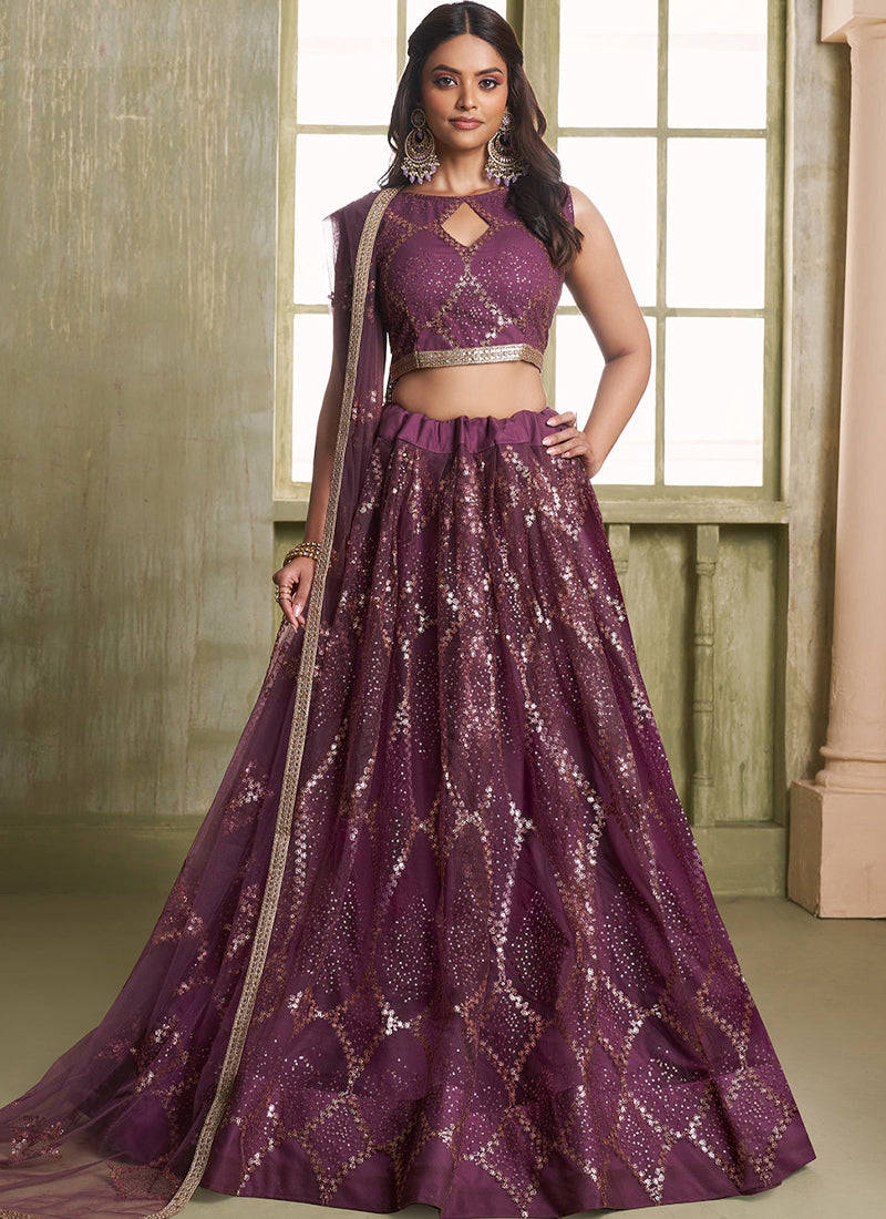 Beautiful Sequence Embroidered Wine Net Lehenga Choli For Wedding