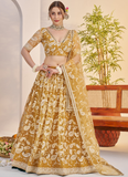 Bewitching Yellow Net Thread Embroidered Haldi Special Lehenga Choli