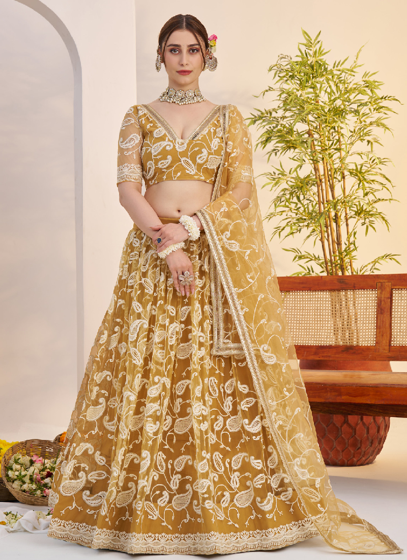 Bewitching Yellow Net Thread Embroidered Haldi Special Lehenga Choli