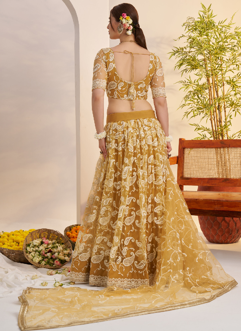 Bewitching Yellow Net Thread Embroidered Haldi Special Lehenga Choli