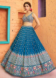 Captivating Thread Embroidered Teal Blue Georgette Lehenga Choli