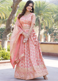 Charismatic Jacquard Sequence Embroidered Work Peach Lehenga Choli