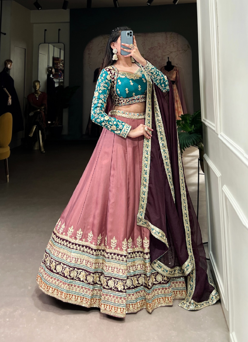 Charismatic Peach Zari Embroidered Work Moonga Silk Lehenga Choli