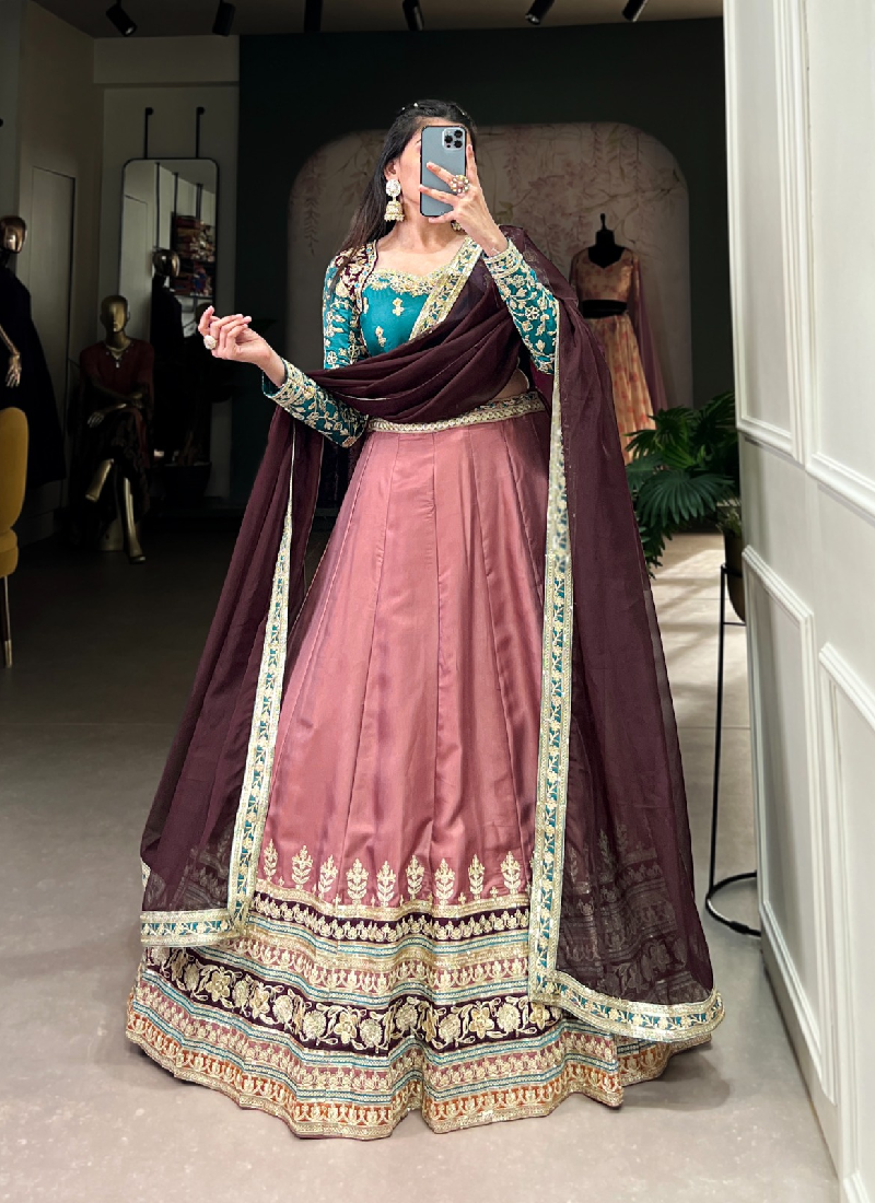Charismatic Peach Zari Embroidered Work Moonga Silk Lehenga Choli
