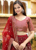Charming Raw Silk Heavy Embroidered Wedding Wear Maroon Lehenga Choli