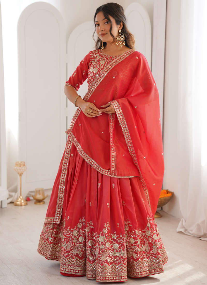 Customary Red Heavy Embroidered Shimmer Silk Lehenga Choli For Women