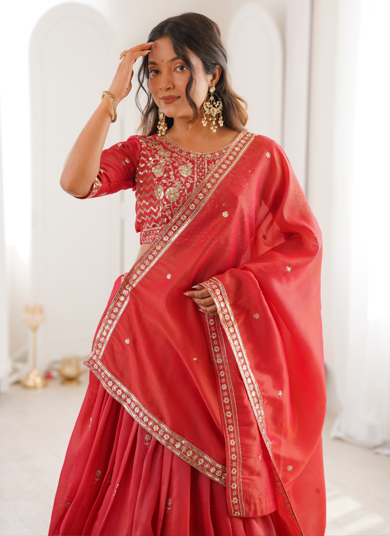 Customary Red Heavy Embroidered Shimmer Silk Lehenga Choli For Women