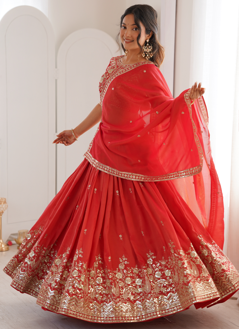 Customary Red Heavy Embroidered Shimmer Silk Lehenga Choli For Women