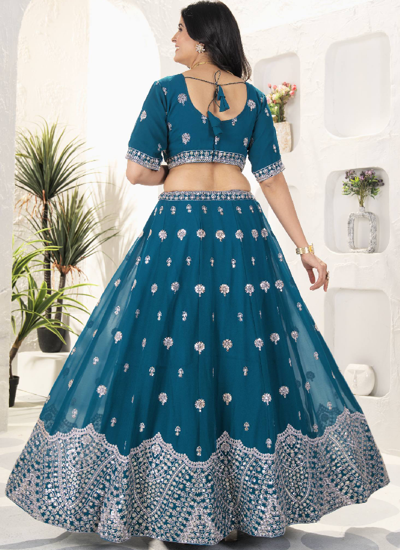 Enhanced Sequence Embroidered Teal Blue Georgette Lehenga Choli