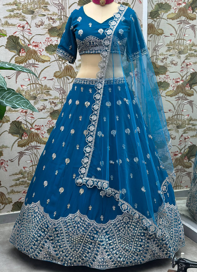 Enhanced Sequence Embroidered Teal Blue Georgette Lehenga Choli