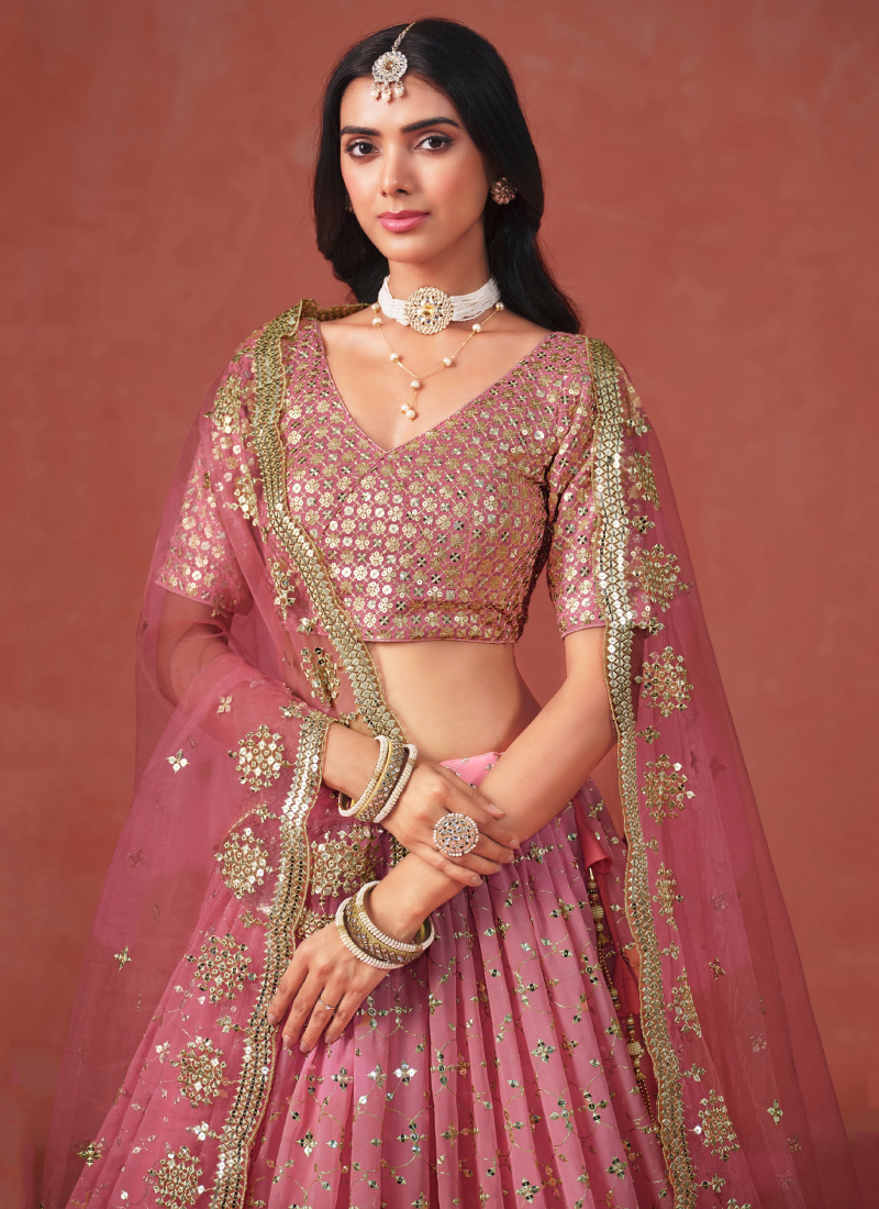 Fantastic Georgette Zari Embroidered Peach Lehenga Choli For Women