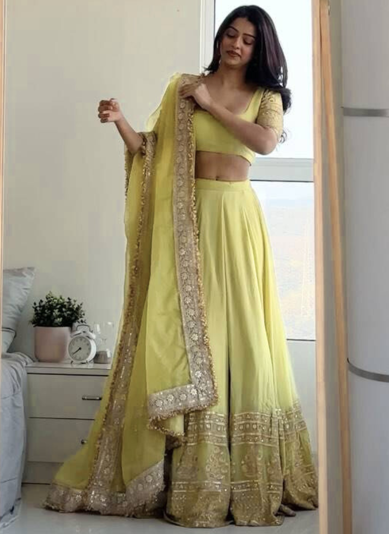 Fascinating Zari Embroidery Georgette Yellow Lehenga Choli For Haldi