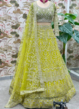 Haldi Special Lemon Yellow Sequence Embroidered Work Net Lehenga Choli