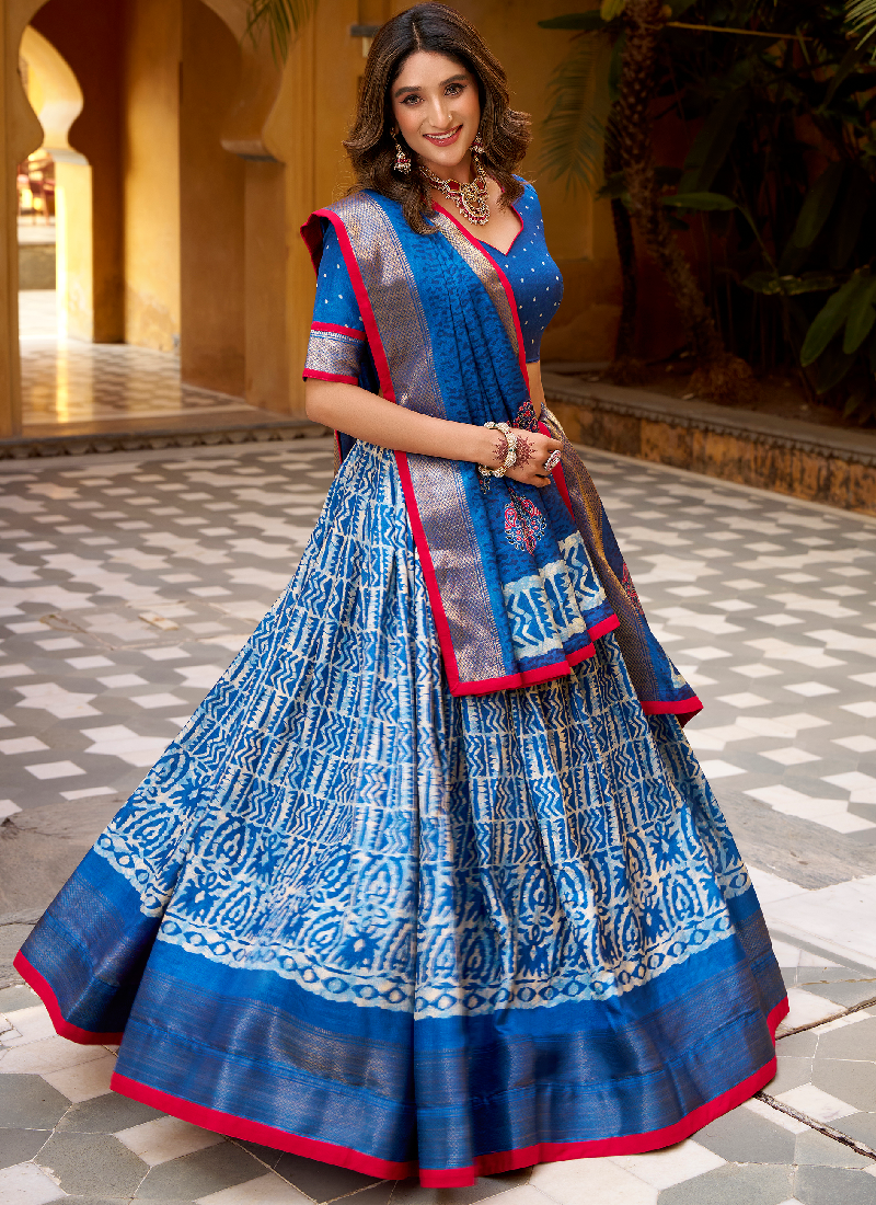 Latest Batik Print With Zari Weaving Dola Silk Blue Lehenga Choli Set