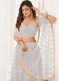 Latest Thread Embroidery Net Party Wear White Lehenga Choli