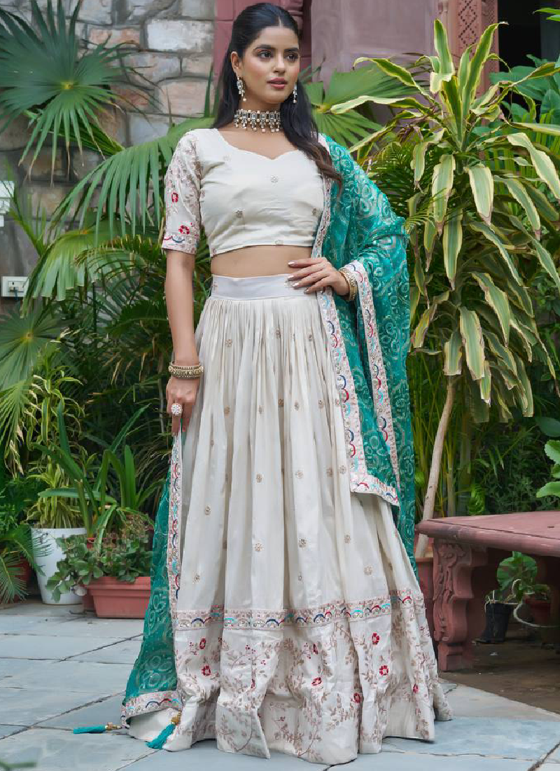 Latest Embroidered Tissue Silk Off White Lehenga Choli With Green Dupatta