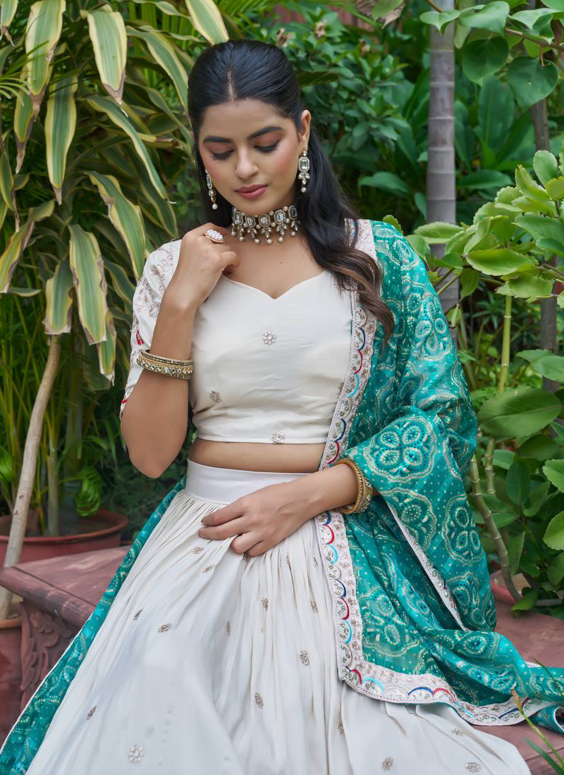Latest Embroidered Tissue Silk Off White Lehenga Choli With Green Dupatta