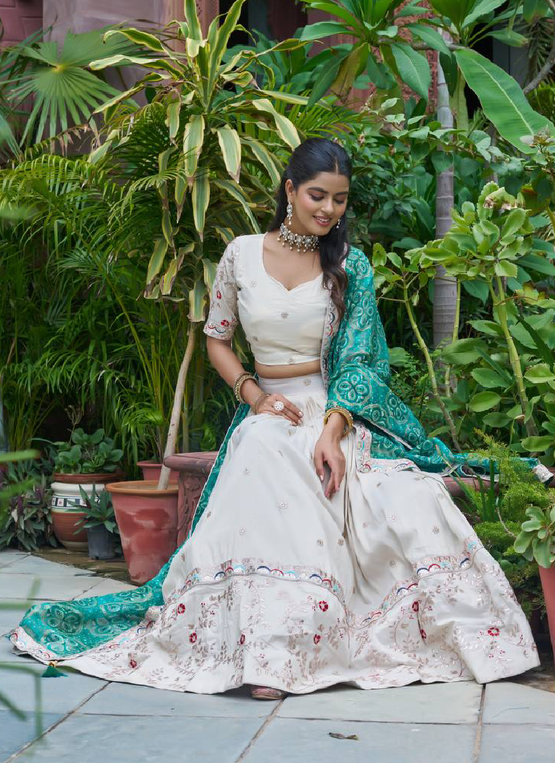 Latest Embroidered Tissue Silk Off White Lehenga Choli With Green Dupatta