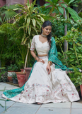 Latest Embroidered Tissue Silk Off White Lehenga Choli With Green Dupatta