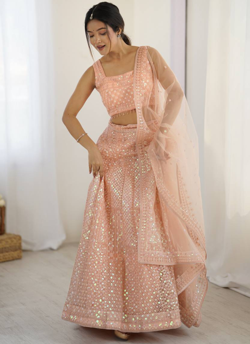 Marvelous Thread Sequence Work Peach Net Lehenga Choli For Wedding