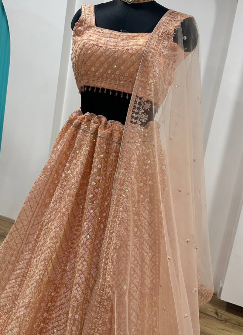 Marvelous Thread Sequence Work Peach Net Lehenga Choli For Wedding