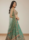 Mesmerizing Pista Green Organza Thread Embroidered Work Lehenga Choli