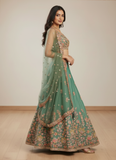 Mesmerizing Pista Green Organza Thread Embroidered Work Lehenga Choli