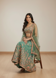 Mesmerizing Pista Green Organza Thread Embroidered Work Lehenga Choli