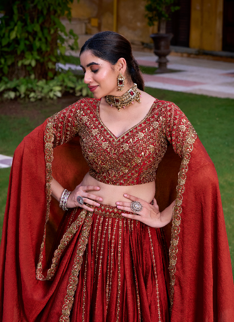 Mesmerizing Zari Embroidered Rangoli Crush Rust Orange Lehenga Choli