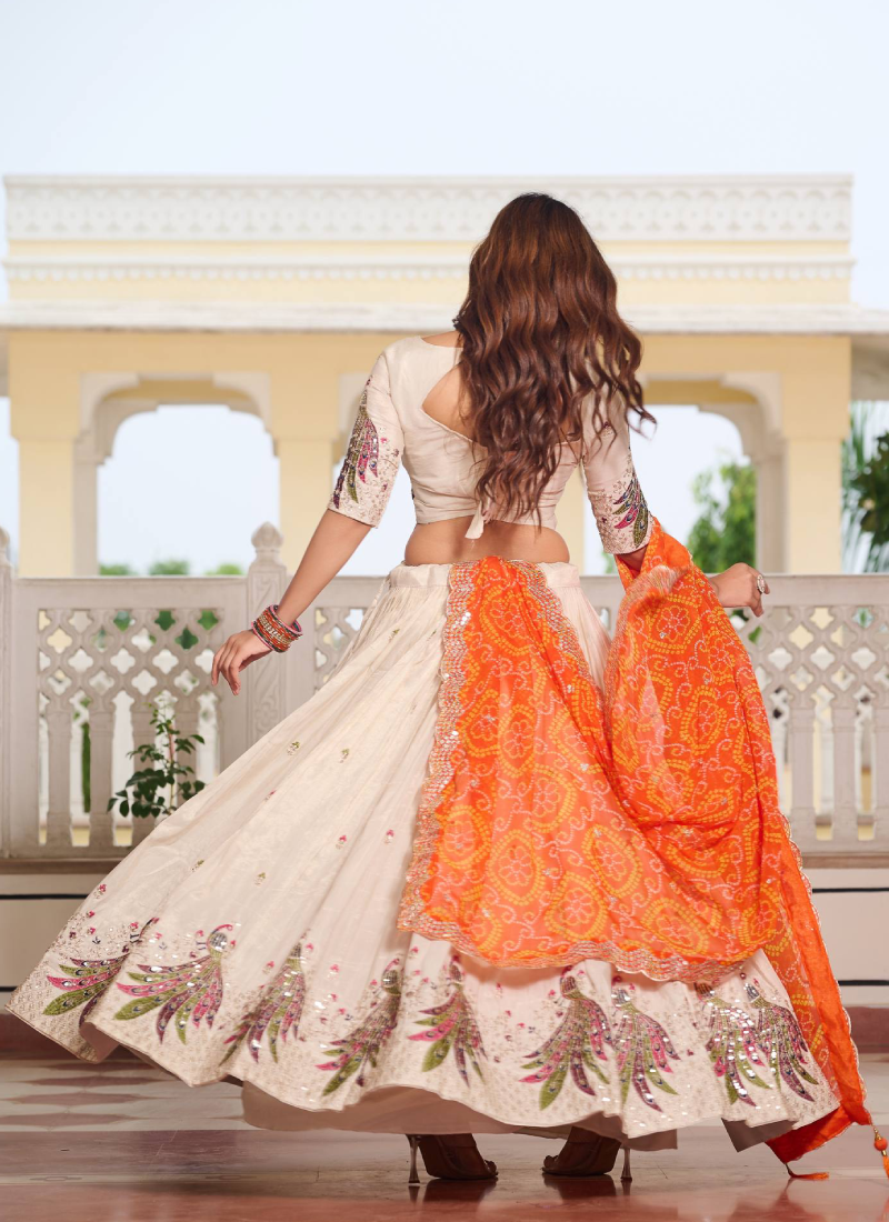 Orange And Cream Tissue Silk Sequence Embroidery Work Lehenga Choli