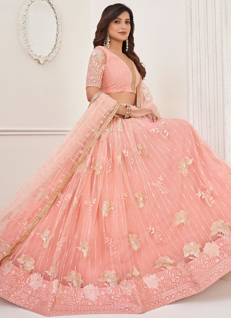 Glamorous Peach Embroidered Net Lehenga Choli For Wedding