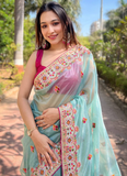 Pink Blouse With Thread Embroidered Sky Blue Net Reception Wear Saree