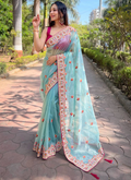 Pink Blouse With Thread Embroidered Sky Blue Net Reception Wear Saree