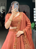 Prodigious Orange Tussar Silk Lehenga With Thread Embroidered Blouse