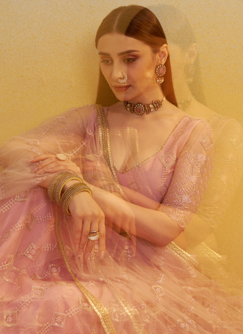 Prominent Thread Embroidery Light Pink Net Lehenga Choli With Dupatta
