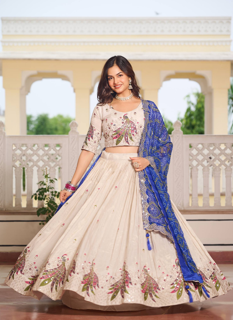 Pure Tissue Silk Multi Thread Embroidered Cream Lehenga Choli For Women
