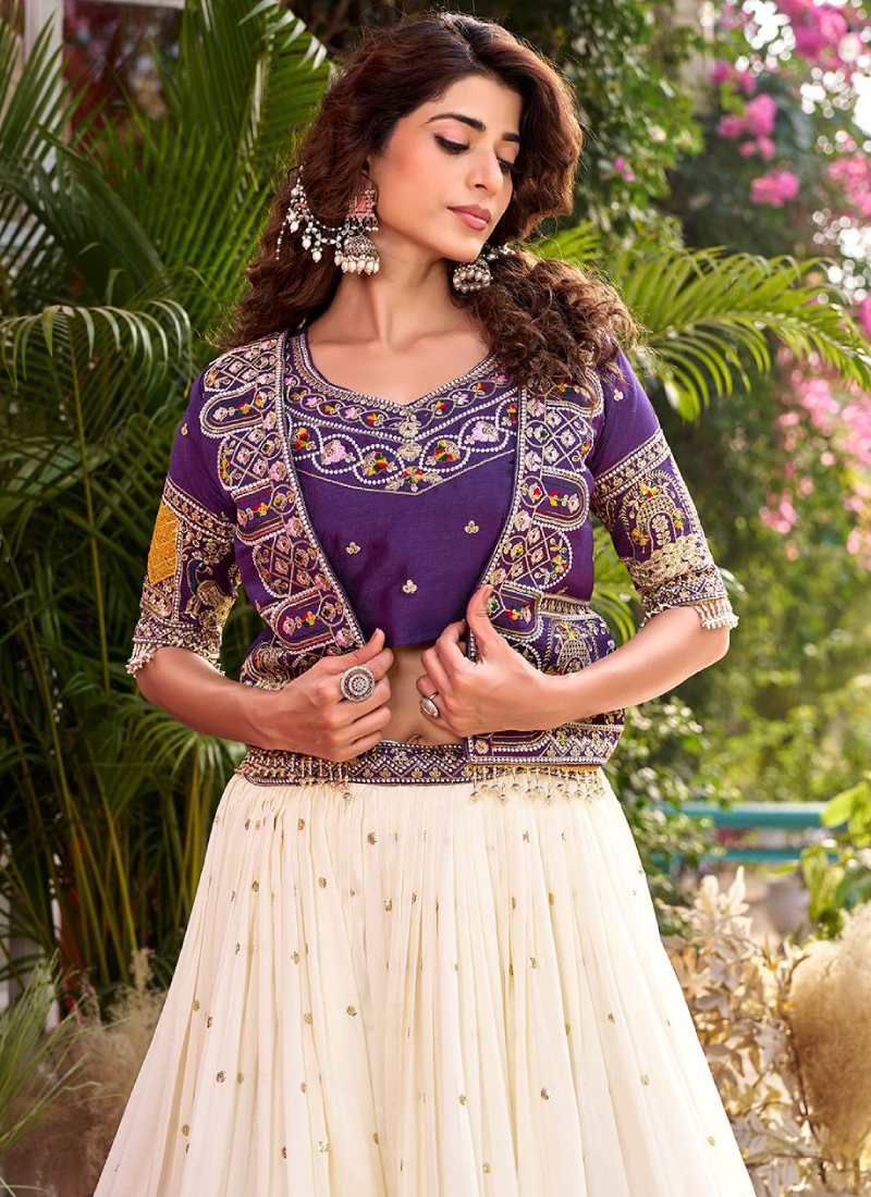 Purple Heavy Embroidered Blouse And Jacket With Beige Silk Lehenga