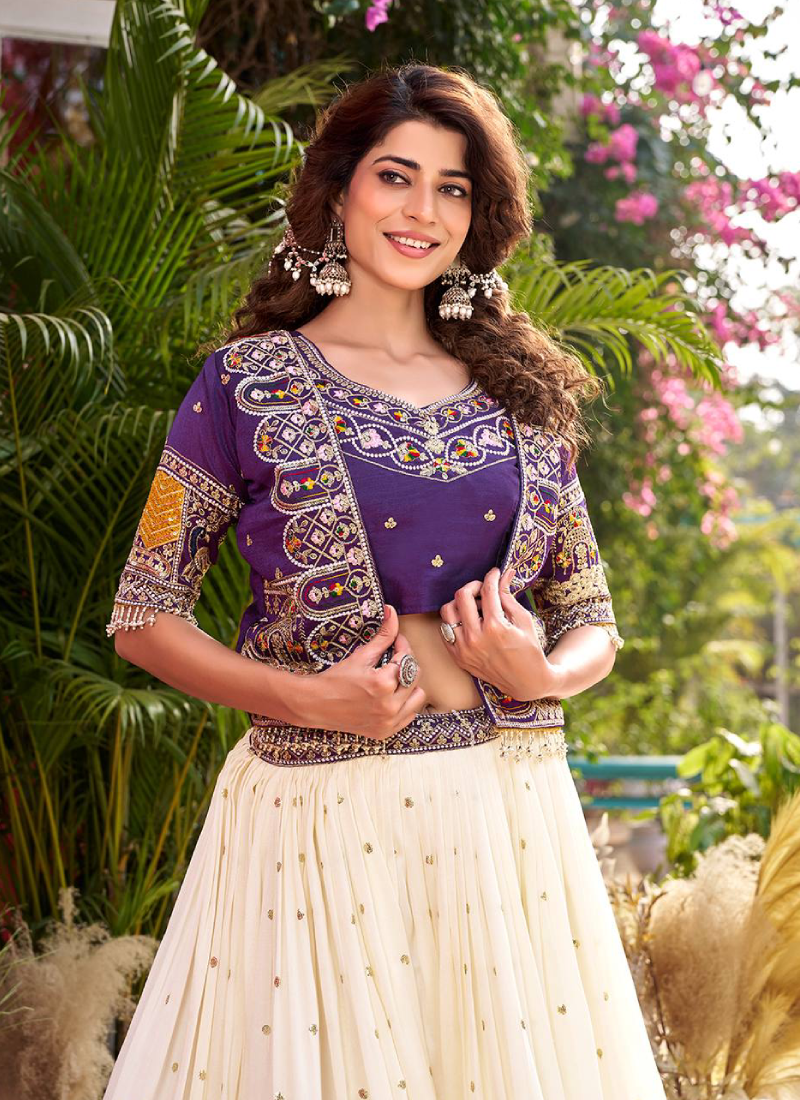 Purple Heavy Embroidered Blouse And Jacket With Beige Silk Lehenga