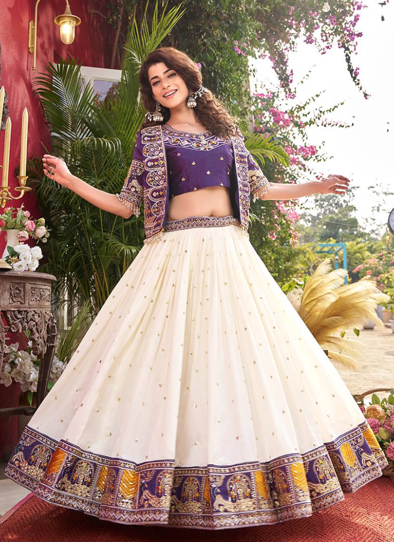 Purple Heavy Embroidered Blouse And Jacket With Beige Silk Lehenga